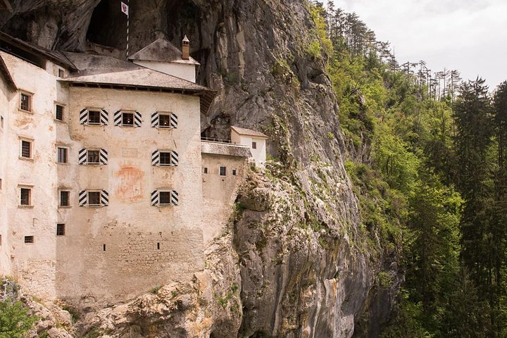 Postojna Cave & Predjama Castle from Trieste