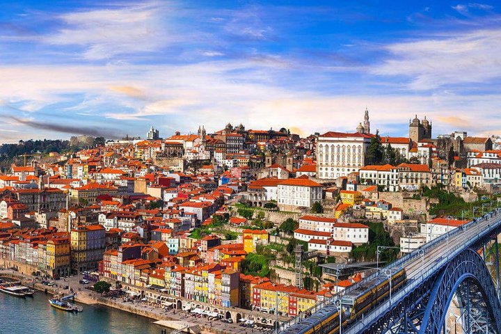 Lisbon to Porto Up to 4 Stops: Obidos, Nazare, Fatima and Aveiro