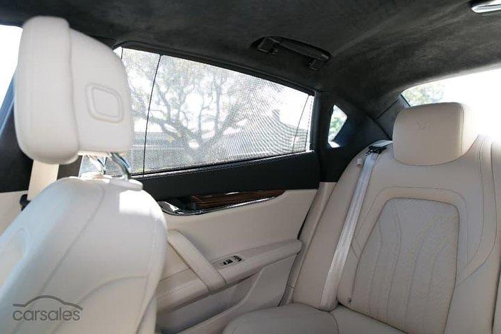 Maserati Quattroporte Limousine Transfer Cairns Airport to City