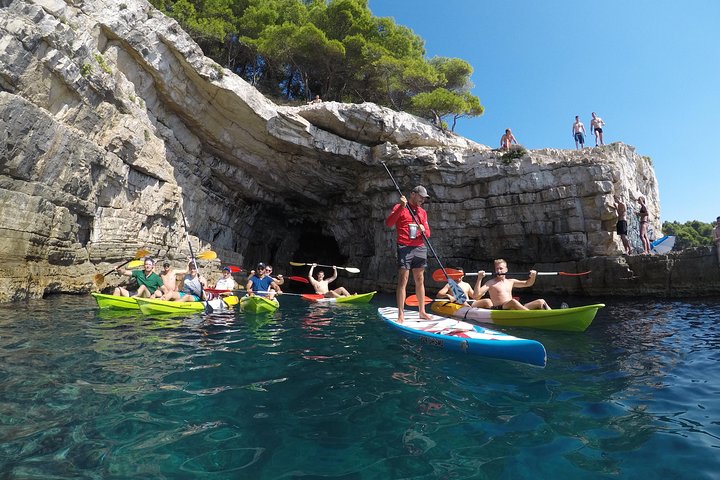 Pula: Sea Cave Kayak Tour with Snorkeling & Cliff Jumping