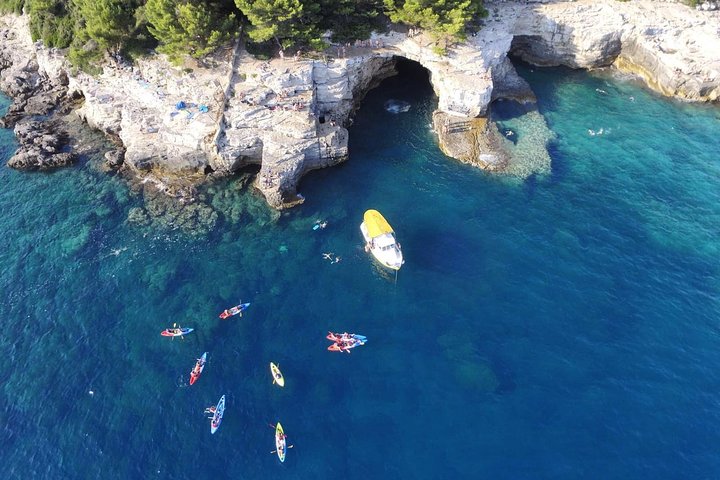 Pula: Sea Cave Kayak Tour with Snorkeling & Cliff Jumping