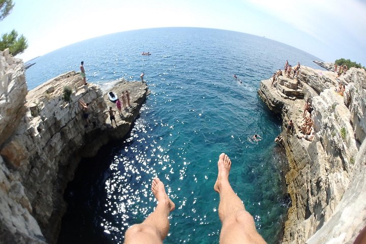 Pula: Sea Cave Kayak Tour with Snorkeling & Cliff Jumping
