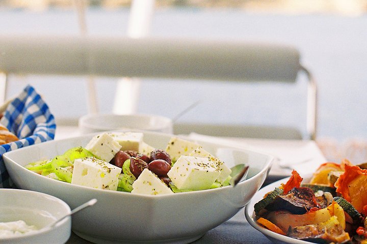 Luxury Athens Catamaran Cruise with Greek Meal & Drinks