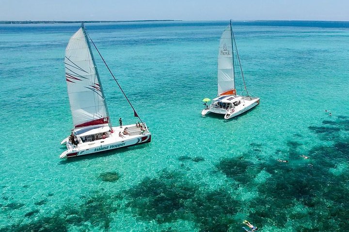 Catamaran to Ile aux Cerf with Parasailing, Tube Riding & Lunch