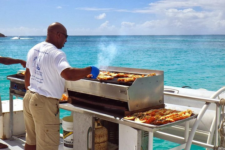 Catamaran to Ile aux Cerf with Parasailing, Tube Riding & Lunch
