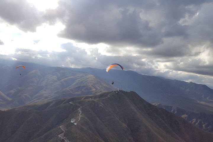 Paragliding free flight experience over the pre-range