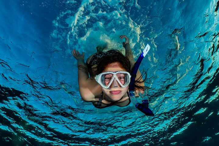 Snorkeling to Undewrater Restaraunt covered by Corals