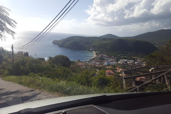 North Tour: rainforest, rum distillery, black sand beach etc