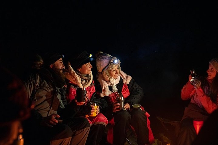 Tromso Aurora Hunt with Bonfire, Meal, Winter Suit & Photos