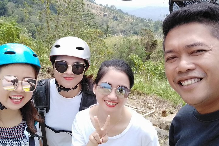 Paragliding and Tangkoko Natural Tourist Park include lunch