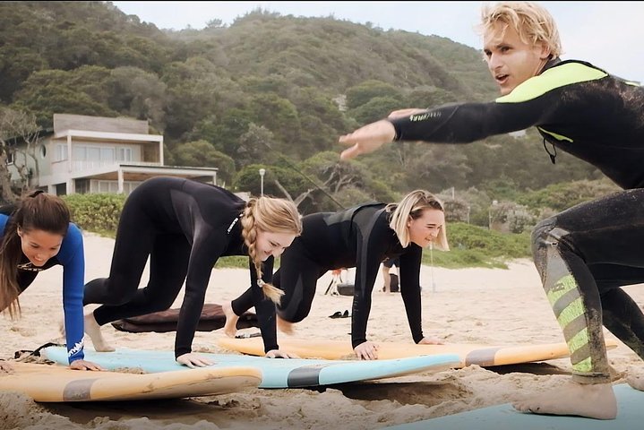 1h15min surfing lessons in Victoria Bay & Wilderness