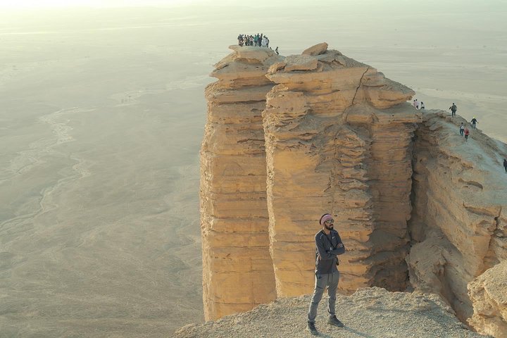 Edge of the World with 4x4 vehicle, camels and stargazing