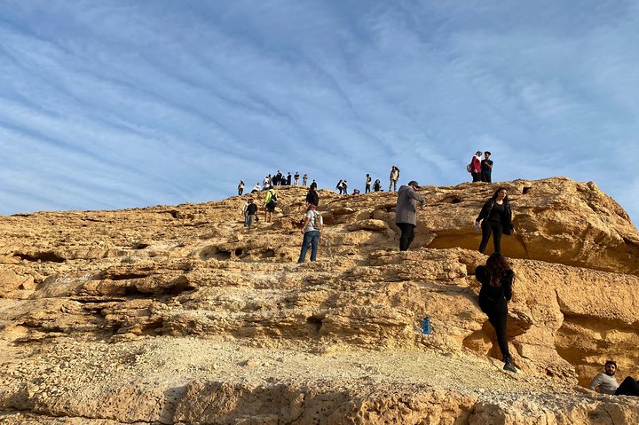 Edge of the World with 4x4 vehicle, camels and stargazing