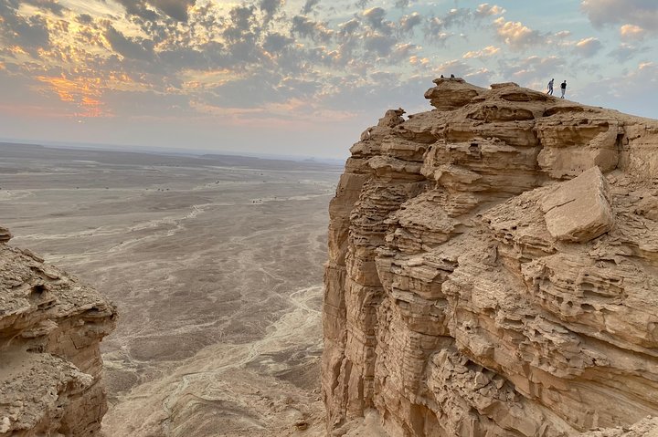 Edge of the World with 4x4 vehicle, camels and stargazing