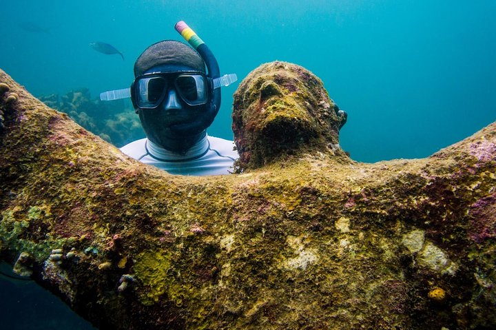 4-hour snorkel cruise to Underwater Sculptures with boat dogs