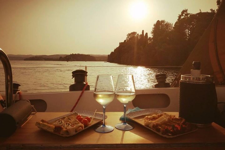 A sunset cruise on Lake Garda, by a private motorsailer