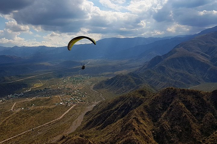Paragliding free flight experience over the pre-range