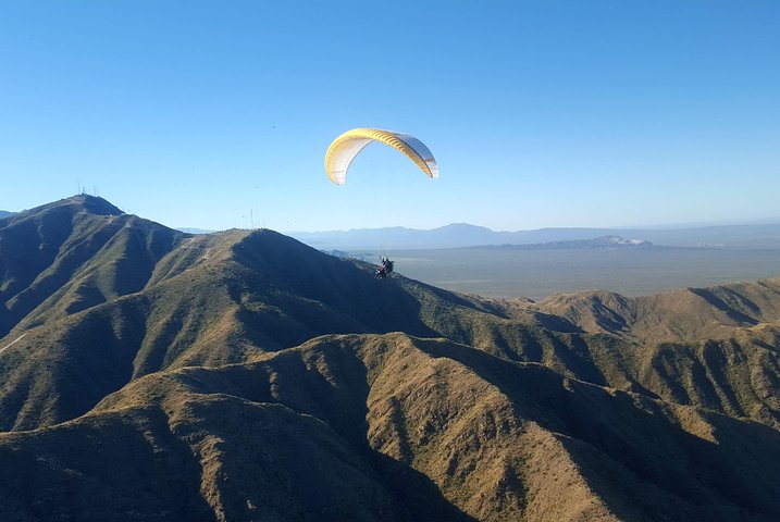 Paragliding free flight experience over the pre-range