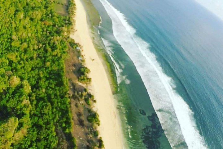 Paragliding Bali at Uluwatu Cliff with Photos/Videos