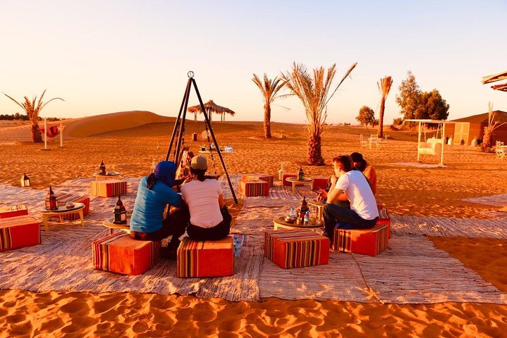 Merzouga: Overnight in luxury desert camp with Camel Ride, meals & sandboarding