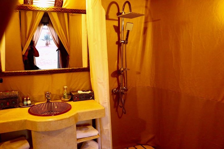 Merzouga: Overnight in luxury desert camp with Camel Ride, meals & sandboarding