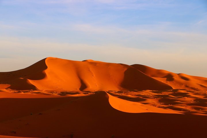 Merzouga: Overnight in luxury desert camp with Camel Ride, meals & sandboarding