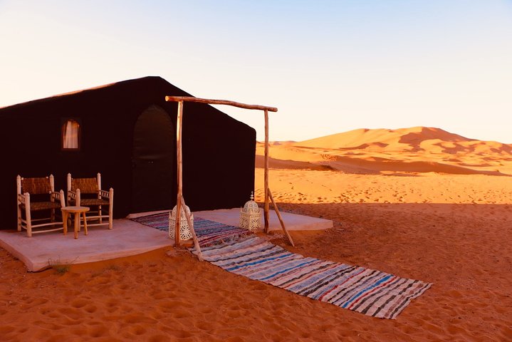 Merzouga: Overnight in luxury desert camp with Camel Ride, meals & sandboarding