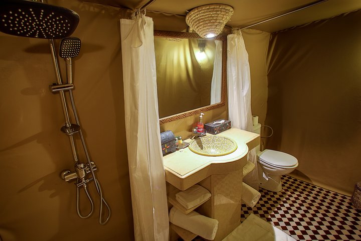 Merzouga: Overnight in Luxury Desert Camp with Camel Ride, meals & sandboarding