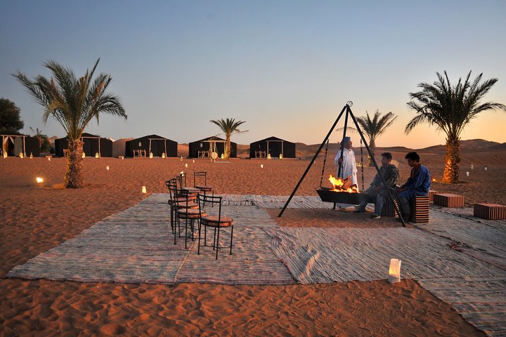 Merzouga: Overnight in luxury desert camp with Camel Ride, meals & sandboarding
