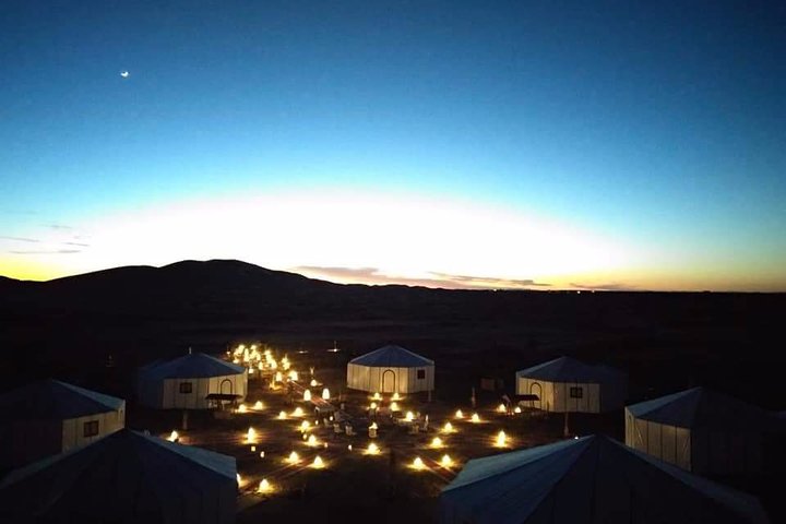 Merzouga: Overnight in Luxury Desert Camp with Camel Ride, meals & sandboarding