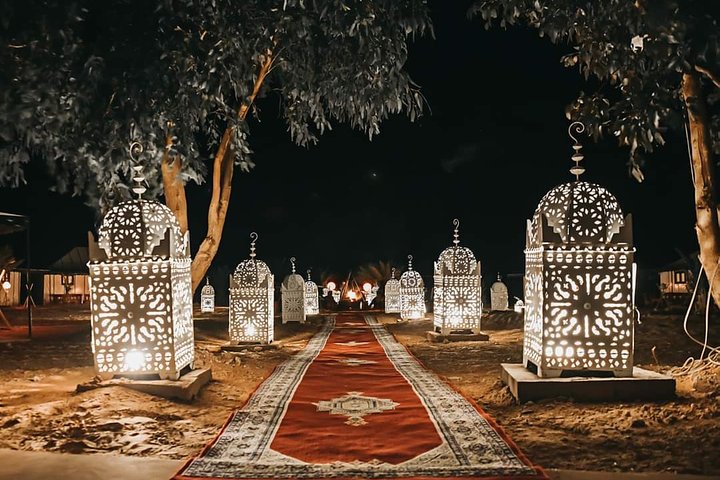 Merzouga: Overnight in Luxury Desert Camp with Camel Ride, meals & sandboarding