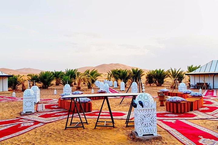 Merzouga: Overnight in Luxury Desert Camp with Camel Ride, meals & sandboarding