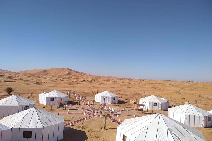 Merzouga: Overnight in Luxury Desert Camp with Camel Ride, meals & sandboarding