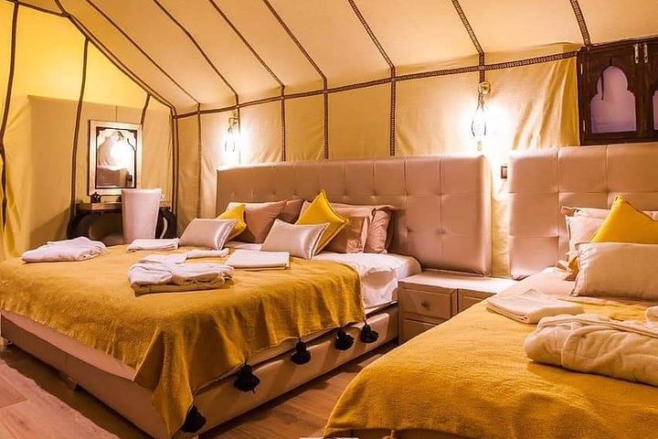 Merzouga: Overnight in Luxury Desert Camp with Camel Ride, meals & sandboarding