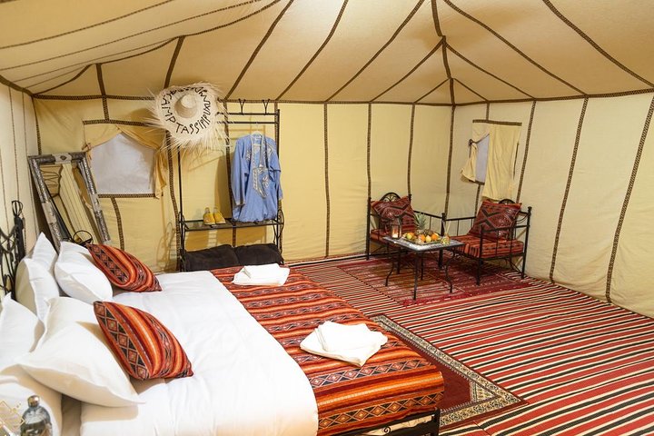 Merzouga: Overnight in Luxury Desert Camp with Camel Ride, meals & sandboarding