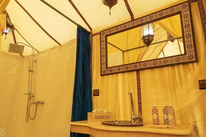 Merzouga: Overnight in Luxury Desert Camp with Camel Ride, meals & sandboarding