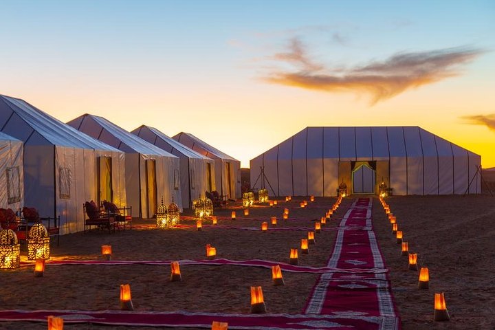 Merzouga: Overnight in Luxury Desert Camp with Camel Ride, meals & sandboarding