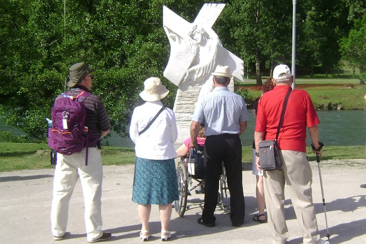 Our Lady of Lourdes, guided tour, on foot, of the sanctuary.
