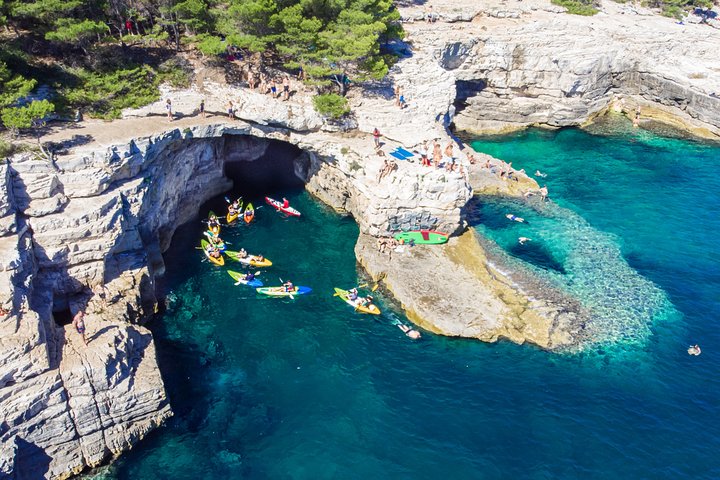 Pula: Sea Cave Kayak Tour with Snorkeling & Cliff Jumping