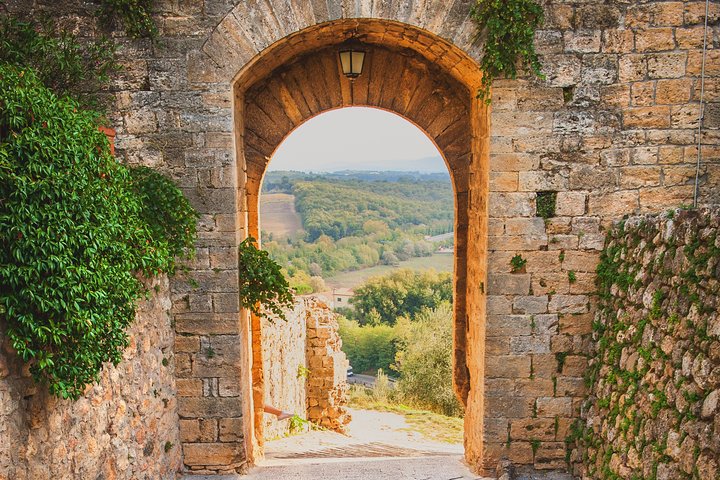 Volterra and San Gimignano with Bocelli's Theatre Private Tour from Lucca