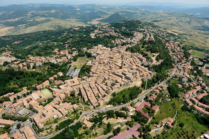 Volterra and San Gimignano with Bocelli's Theatre Private Tour from Lucca
