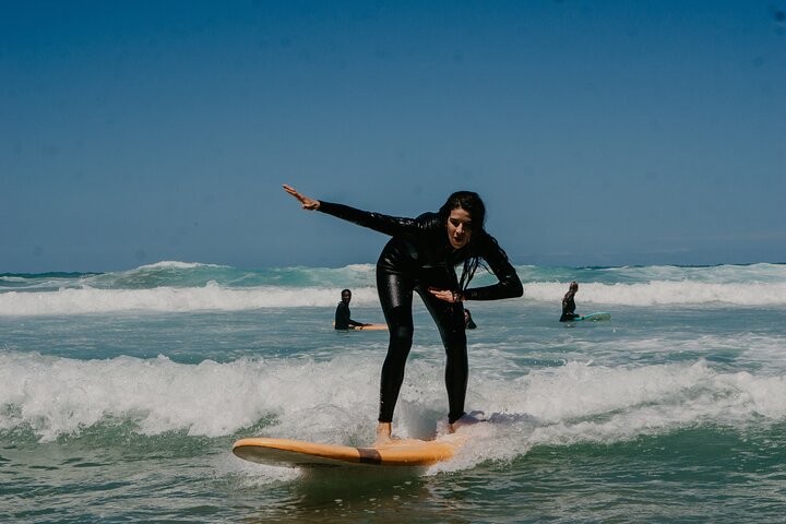 1h15min surfing lessons in Victoria Bay & Wilderness