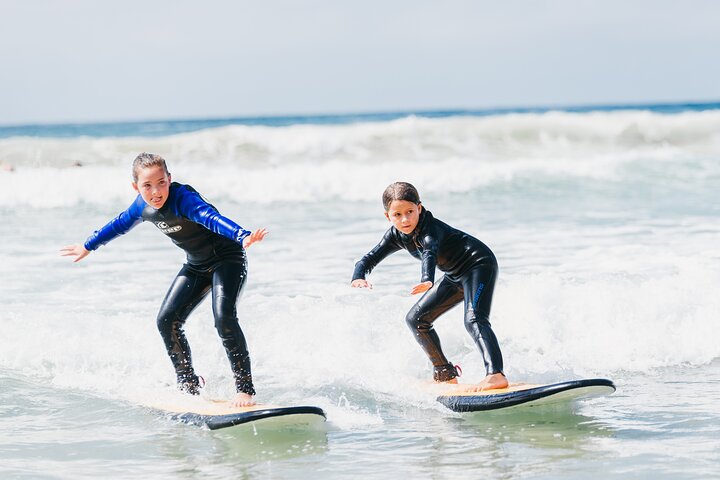 1h15min surfing lessons in Victoria Bay & Wilderness