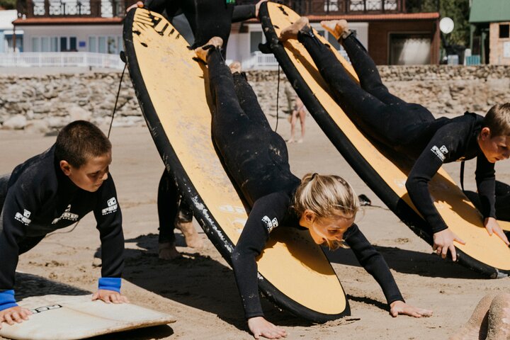 1h15min surfing lessons in Victoria Bay & Wilderness