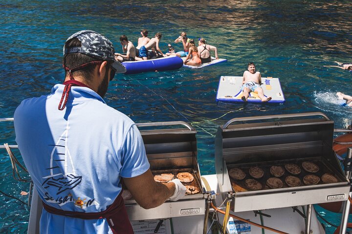 Catamaran ride -Costa Brava with barbecue and drinks. Familiar.
