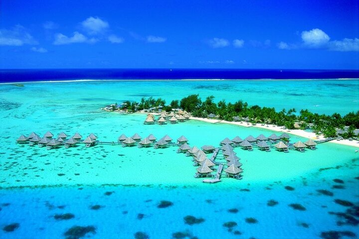 Private flight, in a light plane over the Polynesian motus from Raiatea