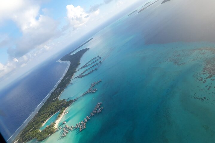 Private flight, in a light plane over the Polynesian motus from Raiatea