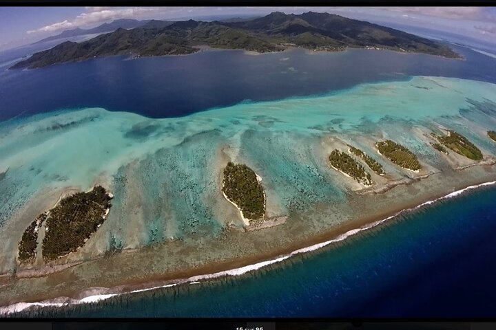 Private flight, in a light plane over the Polynesian motus from Raiatea