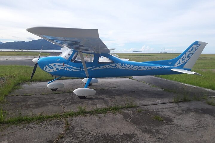 Private flight, in a light plane over the Polynesian motus from Raiatea