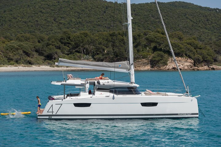 Mykonos: Brand-New Catamaran Cruise with Meal, Drinks & Transport